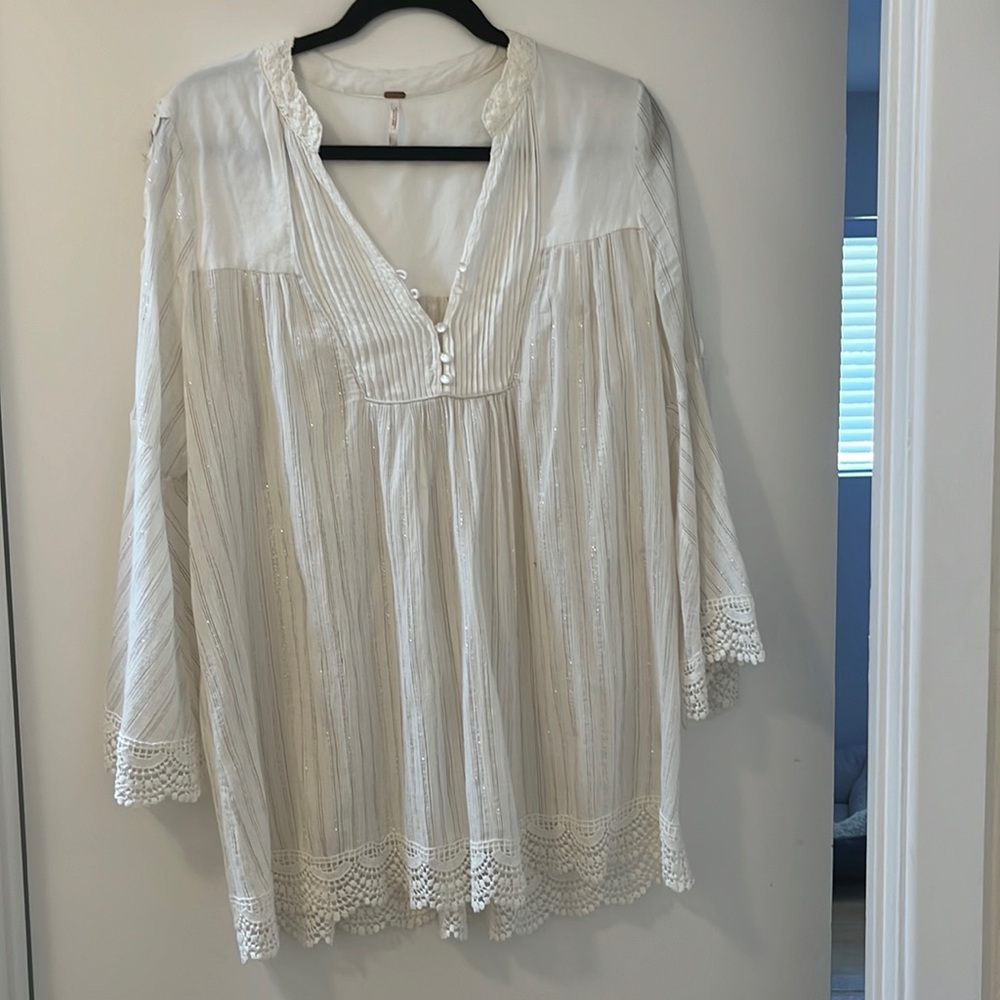 Adorable white free people tunic with silver sparkles!